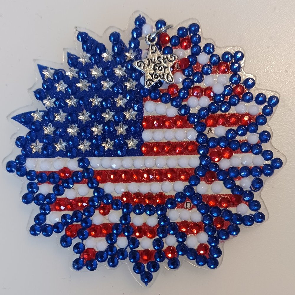 Sun magnet with star charm